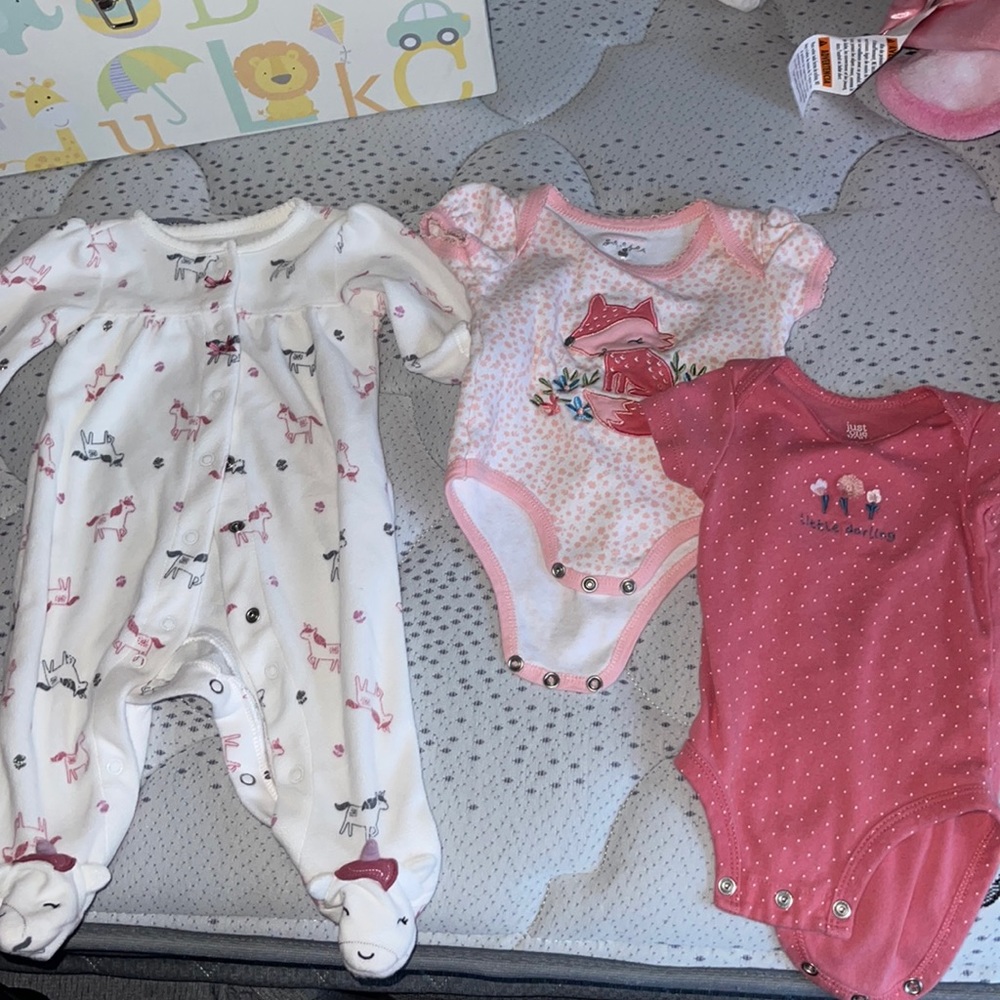 Baby onesie and 2 bodysuits